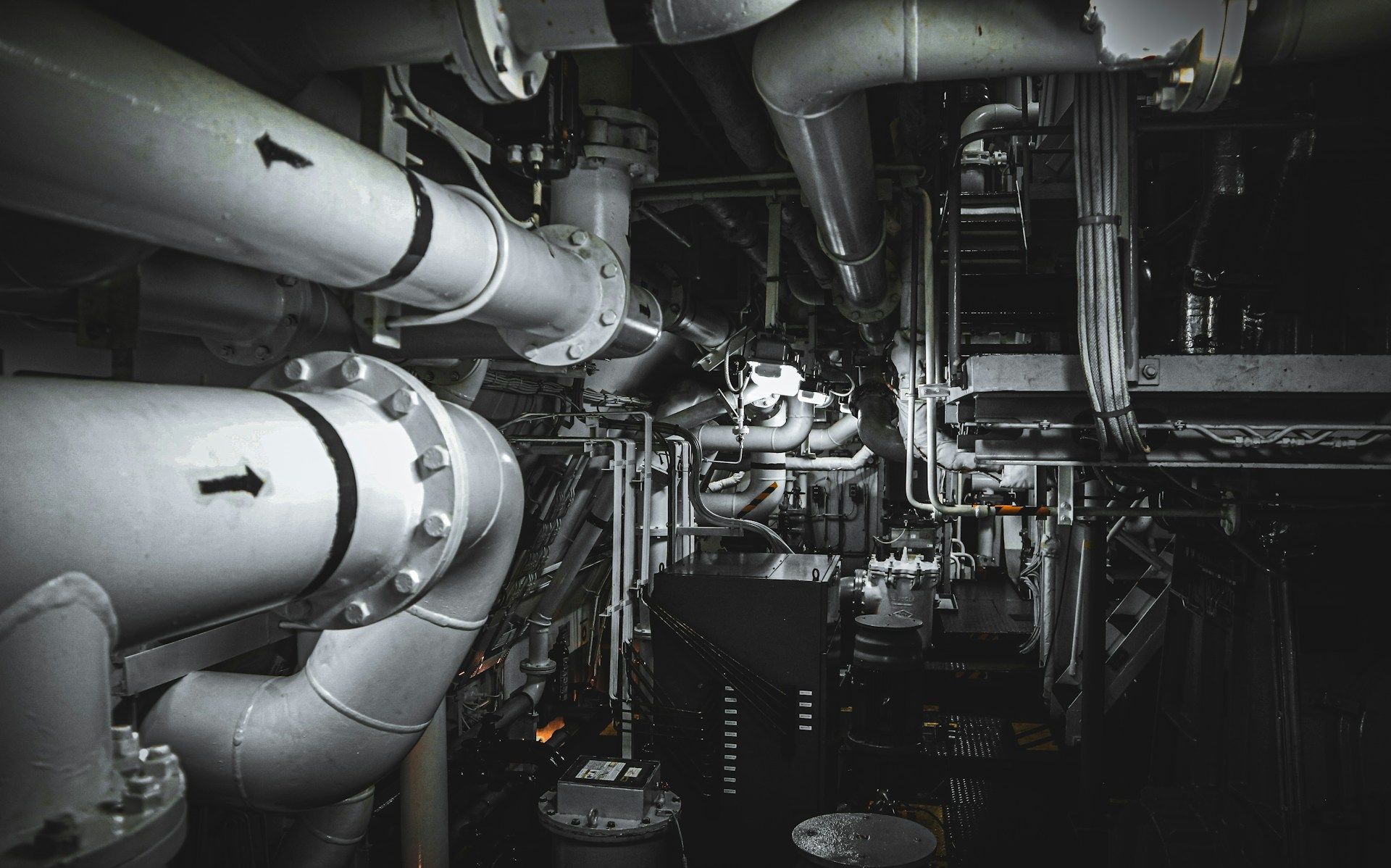 Pipework and machinery inside a vessel engine room